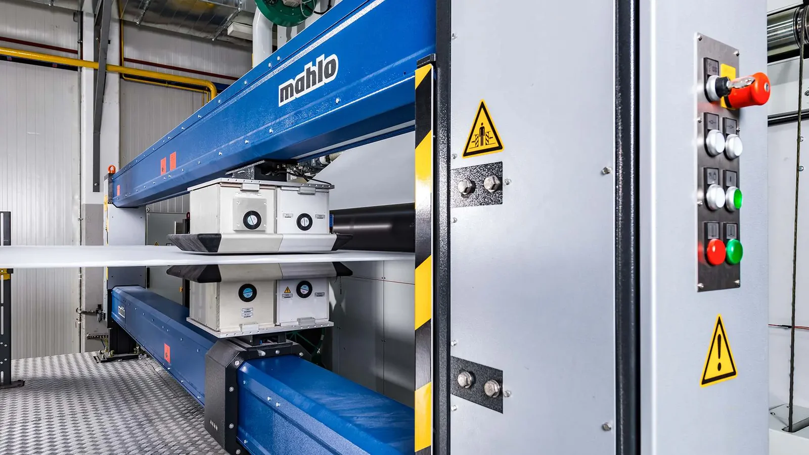 Qualiscan QMS-12 on spunlace plant Quality control measurement on a spunlace nonwoven line