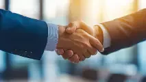 Cooperation Two hands in a handshake